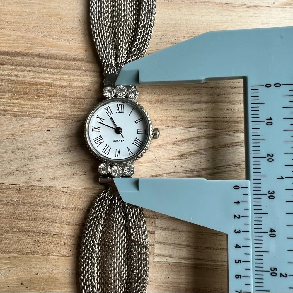 LGP ladies silver tone bracelet fashion watch NEW BATTERY